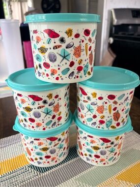 Tupperware Aqua Lid Coastal Seashell Containers (Set of 5)roughly holds 2.5 cps